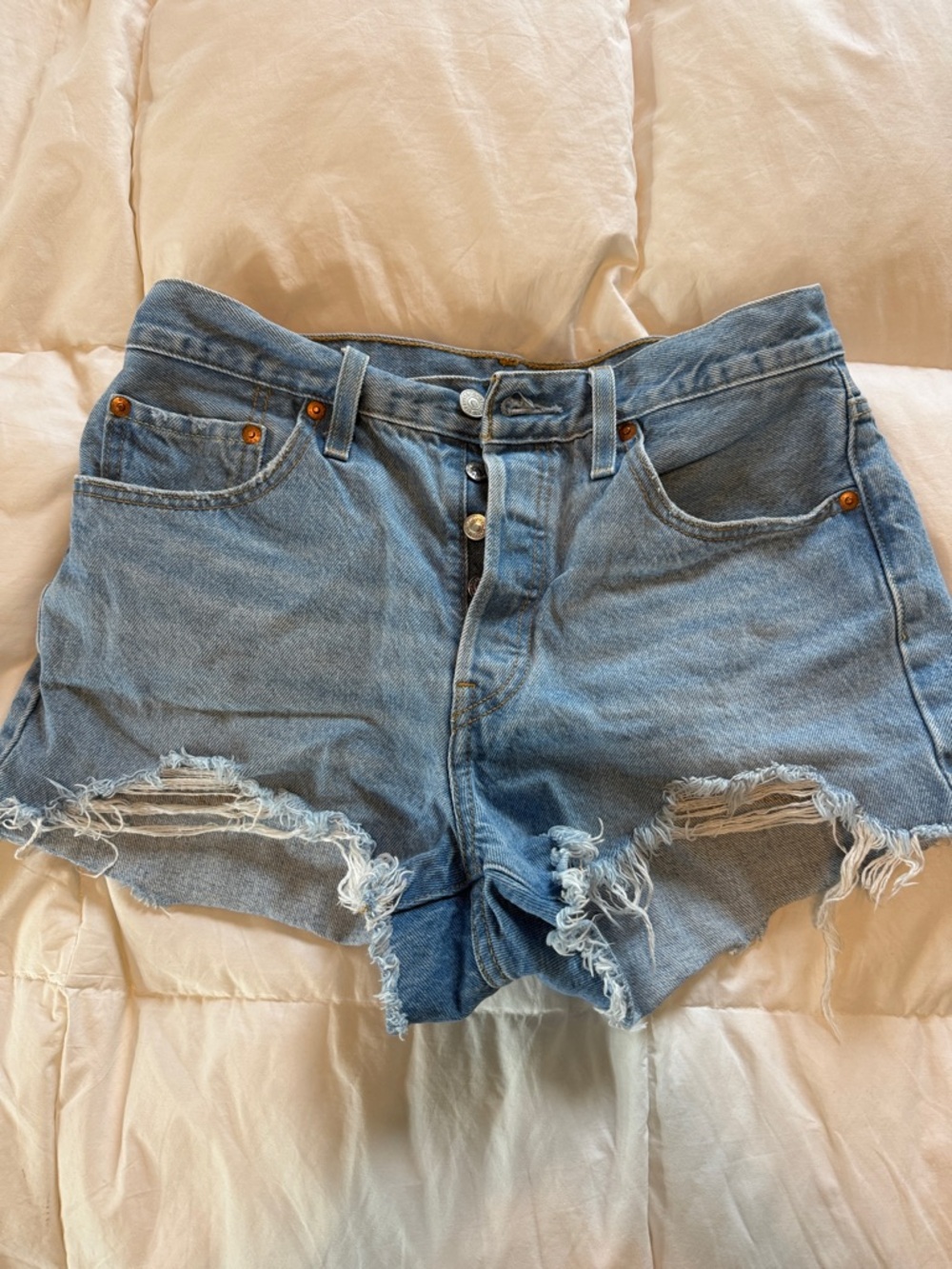 Levi's 501 Light Blue Distressed High-Rise Jean Shorts